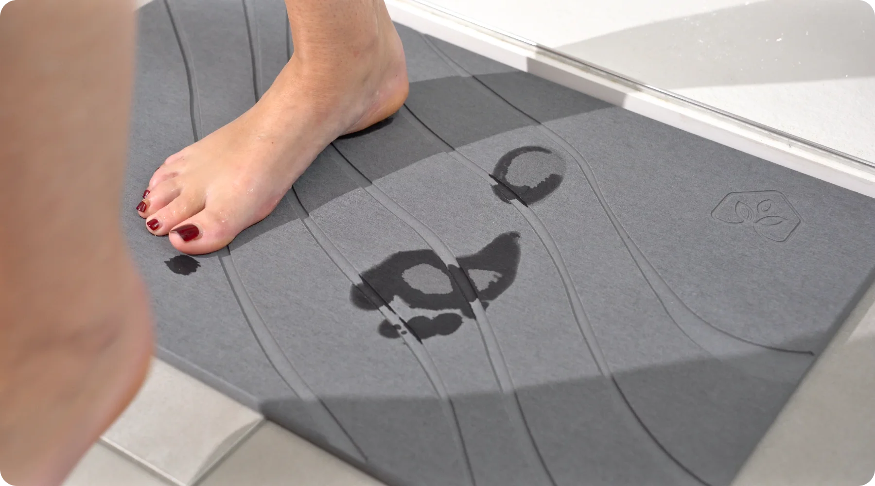 Why Fabric Bath Mats Can't Win the Moisture Battle